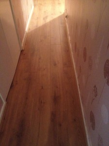 Laminate Flooring Traditional Oak Here we have laid 8mm Tarditional Oak in a Hallway with matching Scotia to perimeters.