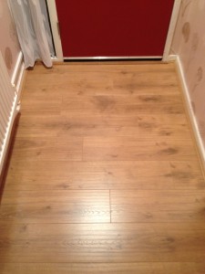 Laminate Flooring Traditional Oak Here we have laid 8mm laminate in a Hallway entrance. This Laminate is perfect for high traffic areas as it is very durable and has a scratch resistant coating perfect entrance ways.